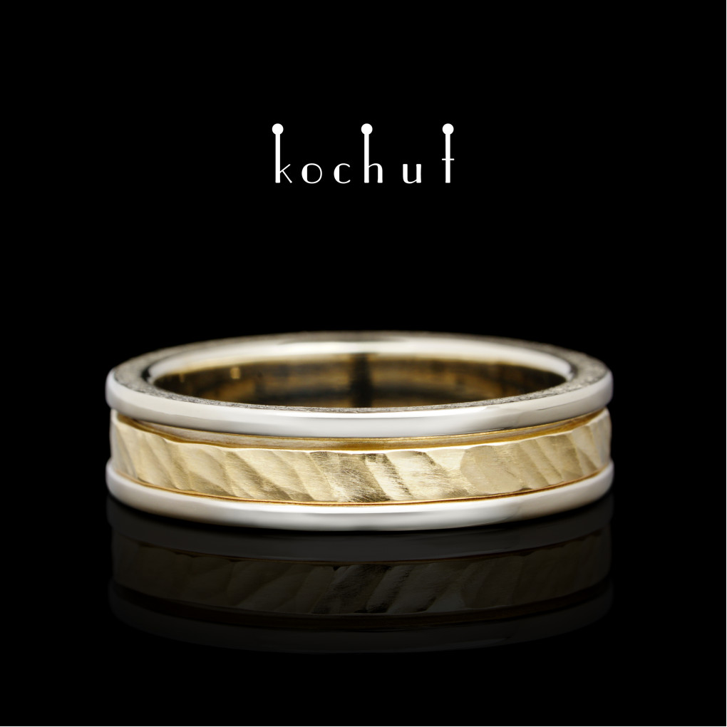 Kinematic wedding ring «Memoria». White, yellow gold