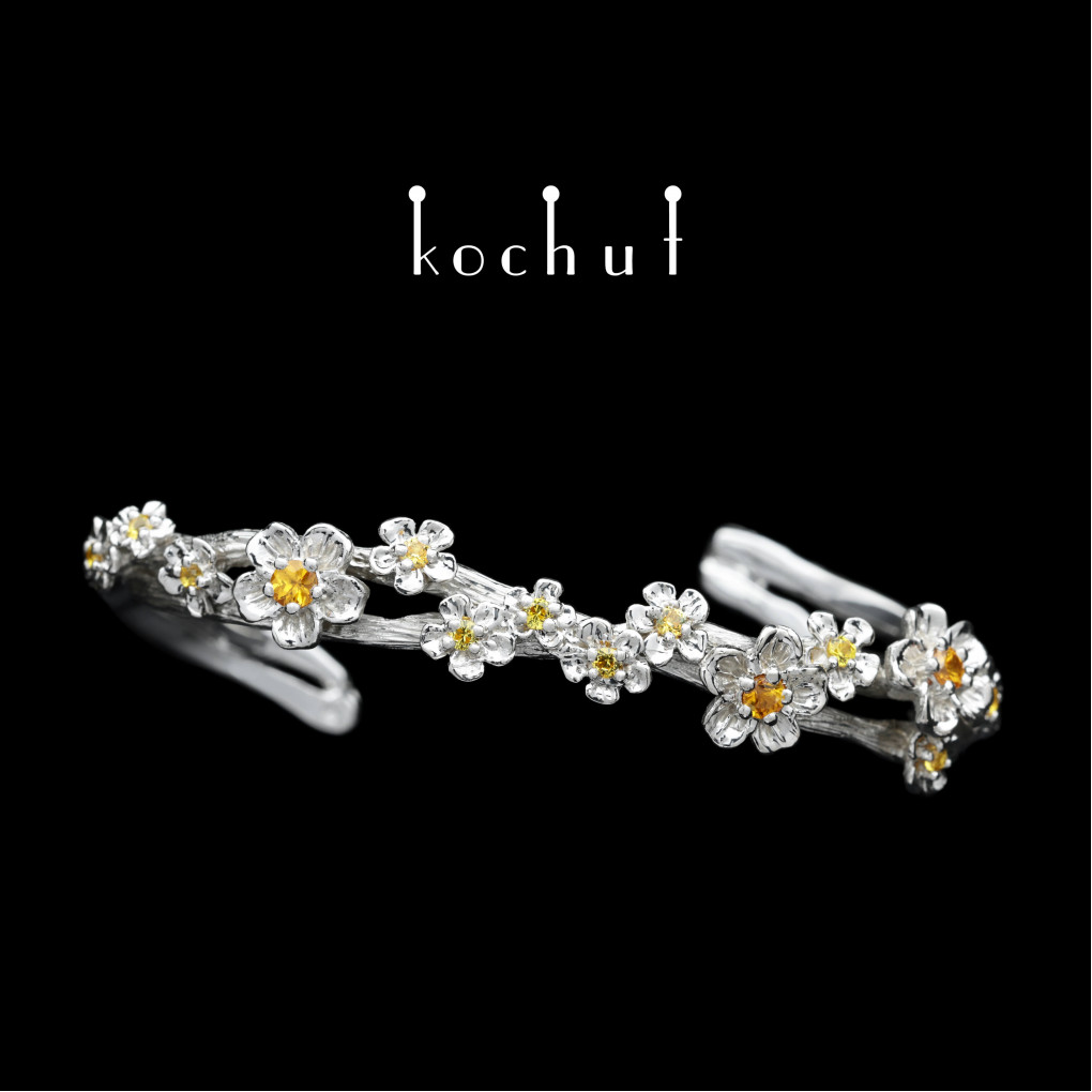 Bracelet «Flower tiara». Silver, white rhodium, yellow and orange sapphires