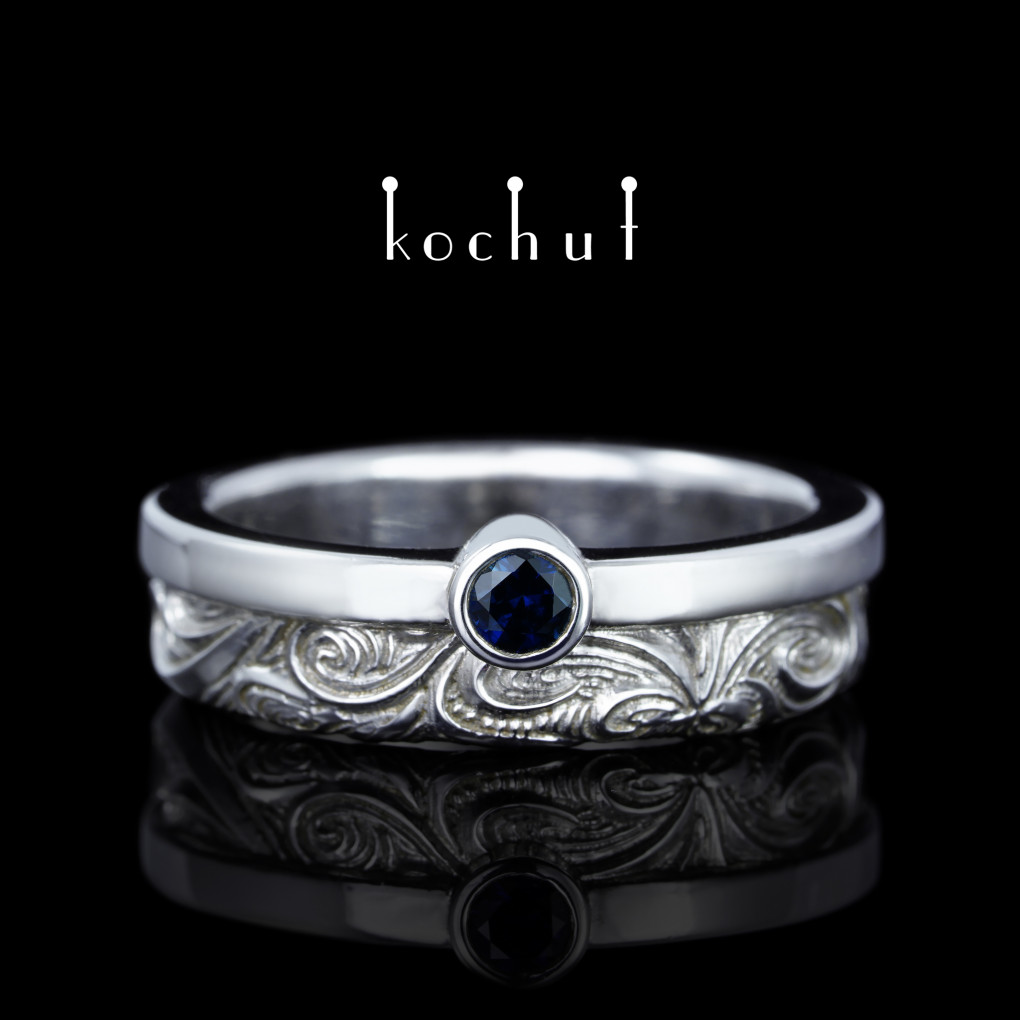 Wedding ring «In joy and in sorrow: halves». Silver, sapphire, white rhodium
