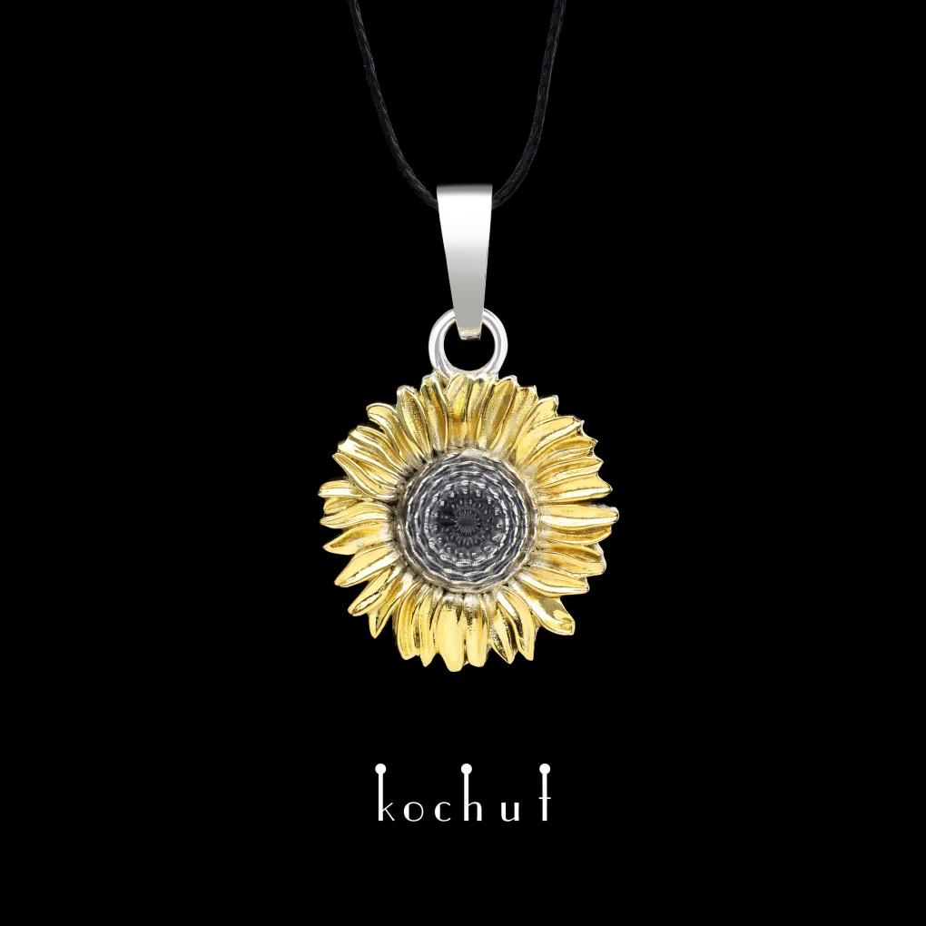 Pendant «Flower of the Sun». Silver, oxidized, gilding