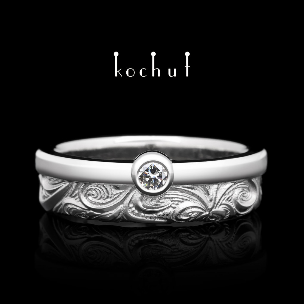 Wedding ring «In joy and sorrow: halves». Platinum, diamond