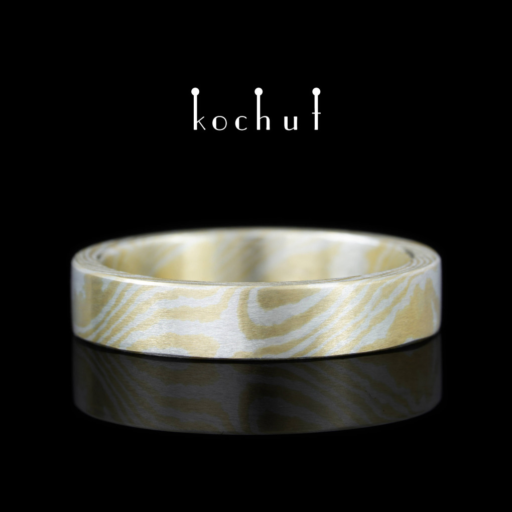 Mokume wedding ring «Kanso». Silver, yellow gold