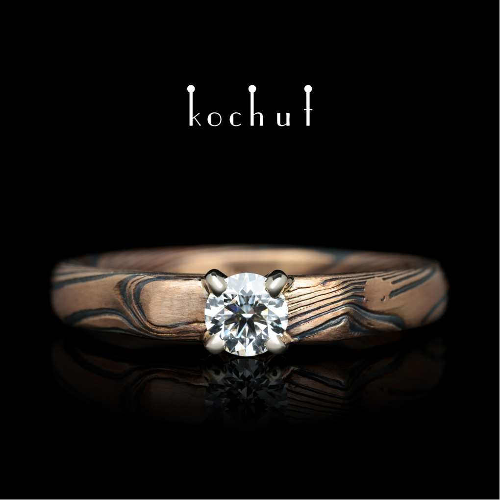 Ring mokume «Empress Kojun». White and red gold, etched silver, diamond, oxidized