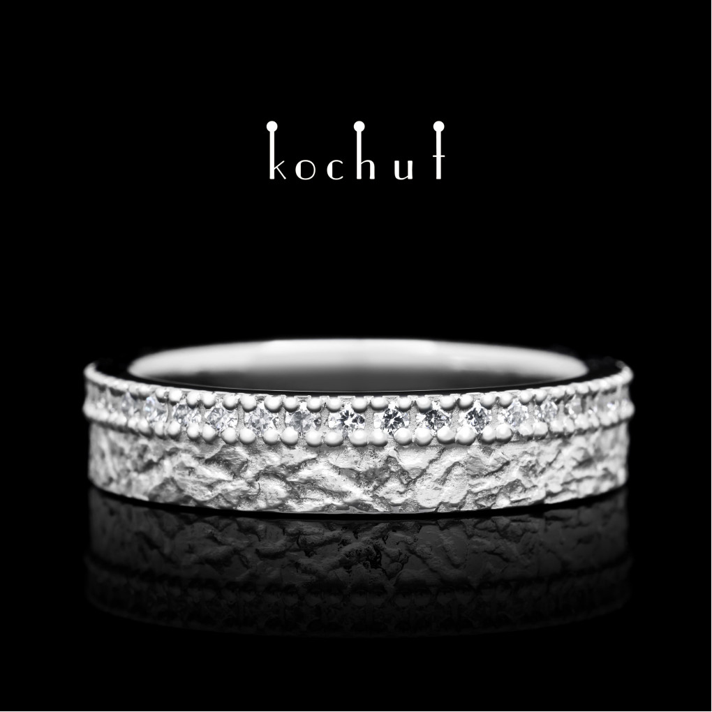 Wedding ring «Flow of time». Platinum, diamonds
